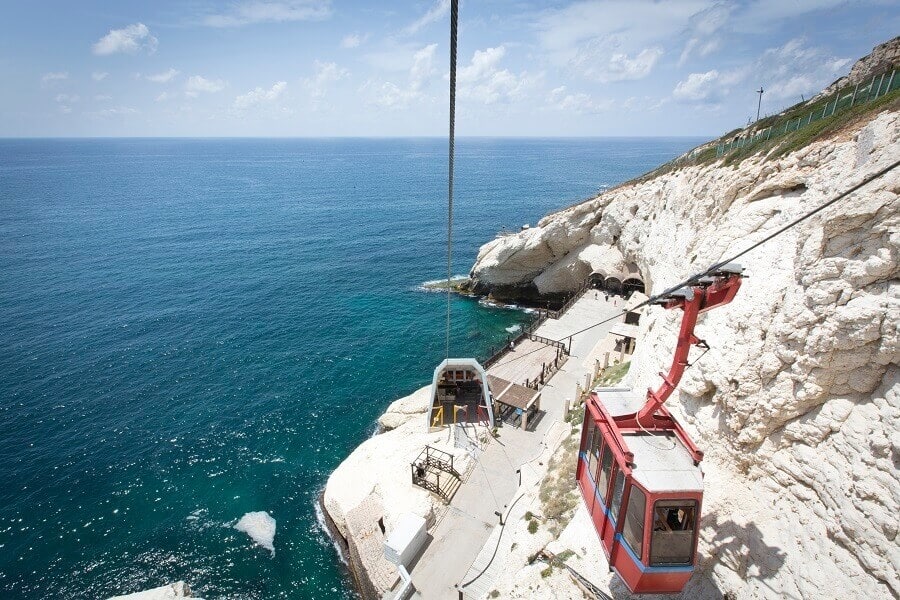 Taking the Cabel Car to the grrotoes, Rosh Hanikra.