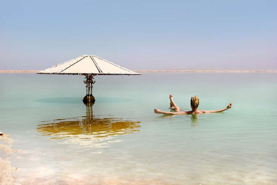 A tourist floating in the Dead Sea
