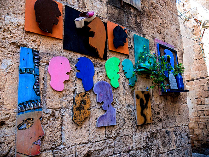Wooden masks on the wall in Acre Old City