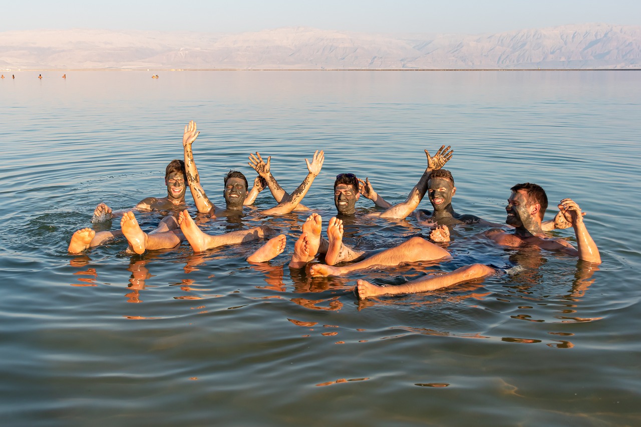 Is it Safe to Travel to Israel Right Now?- Tourists chilling in the Dead Sea