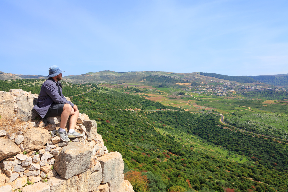 Tourist enjoying the beautiful view at the Golan Heights