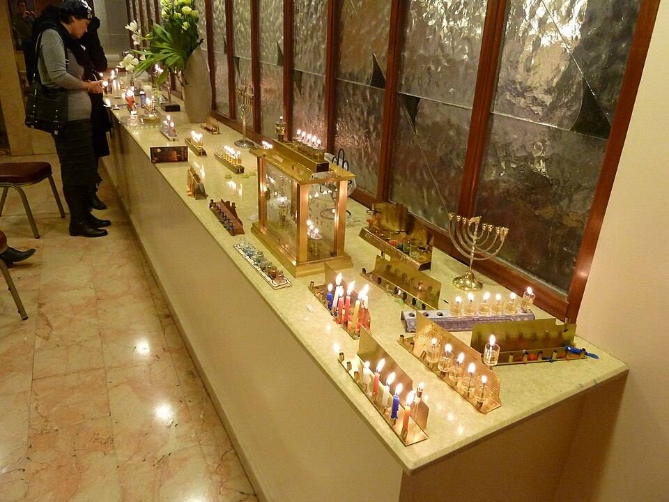Lit Hanukkah menorahs in Jerusalem, a typical sight for visitors during Hanukkah in Israel 2026