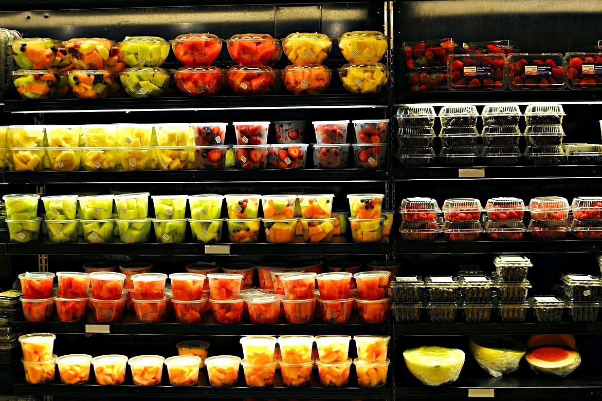 Freshly cut organic fruit in a supermarket