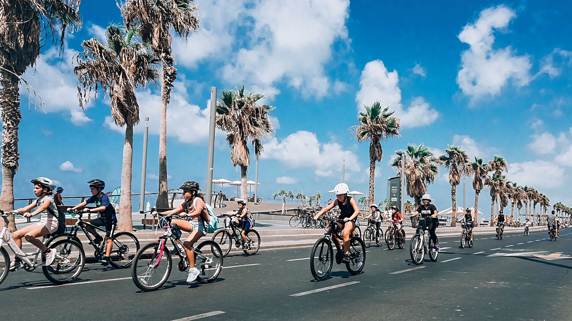 Children riding bicycles in Tel Aviv on Yom Kippur