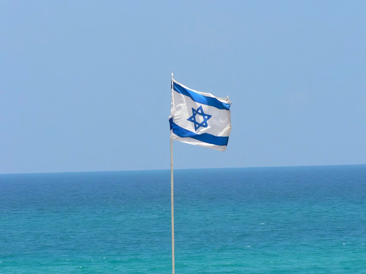 Israel’s flag above the Mediterranean, Rishon LeZion Israel’s flag flying above the Mediterranean at Rishon LeZion beach.