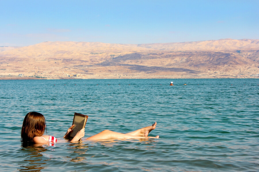 Tourist floating in the Dead Sea
