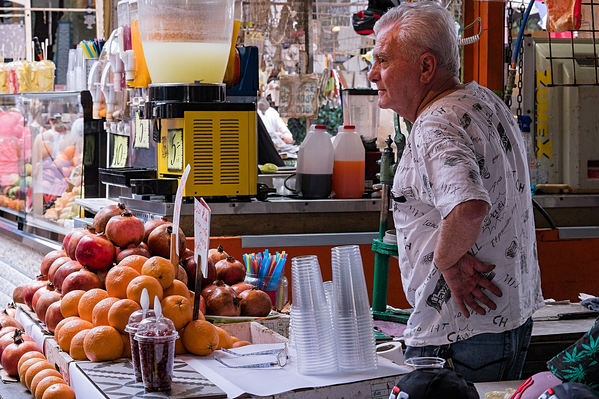 Orange juice seller, Carmel Market, Tel Aviv