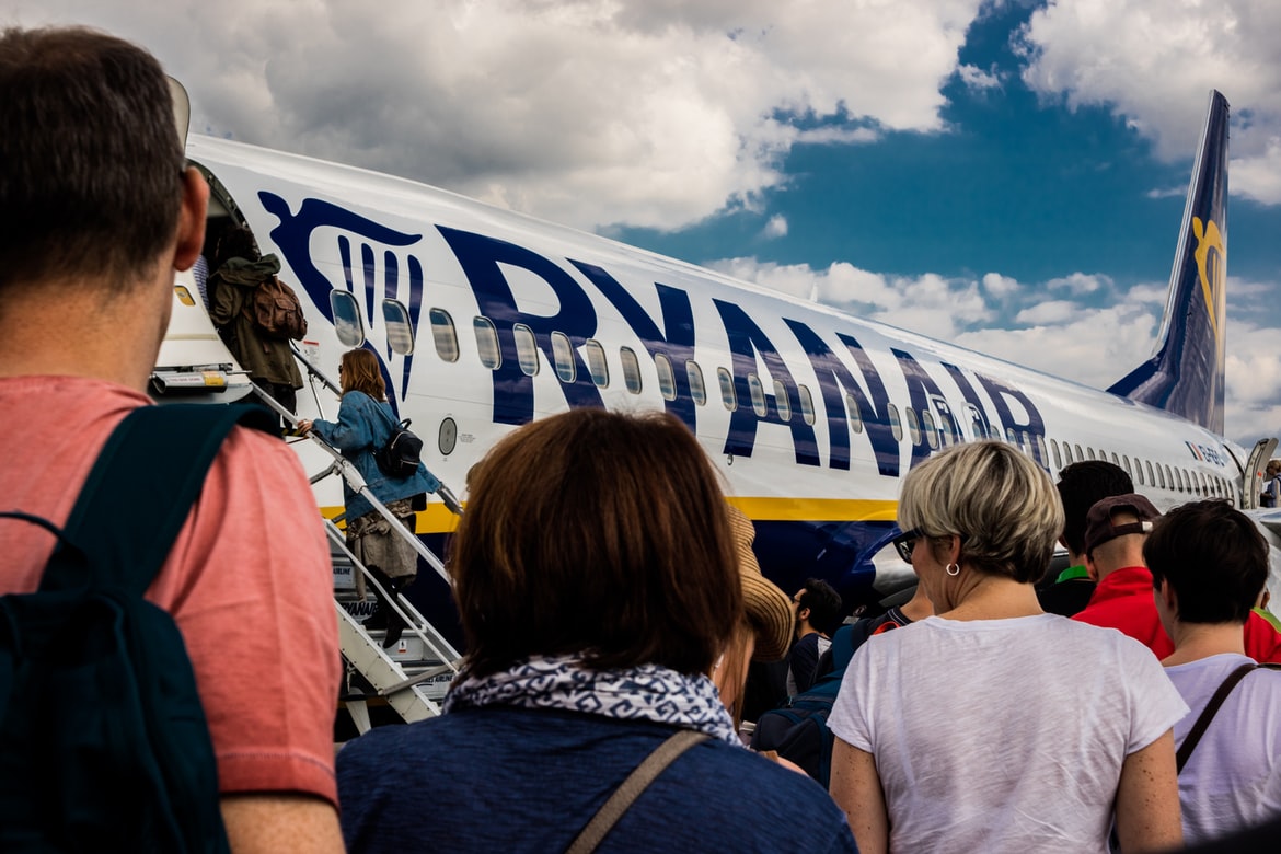 Passengers entering a Ryanair plane