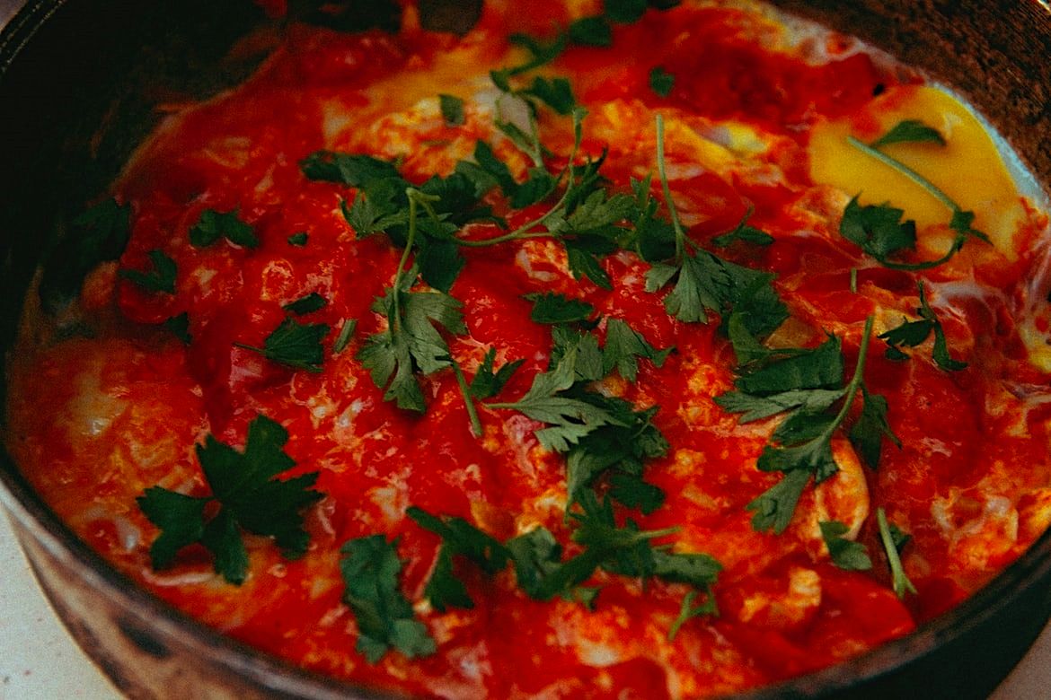 Shakshuka, a dish of eggs poached in tomato sauce