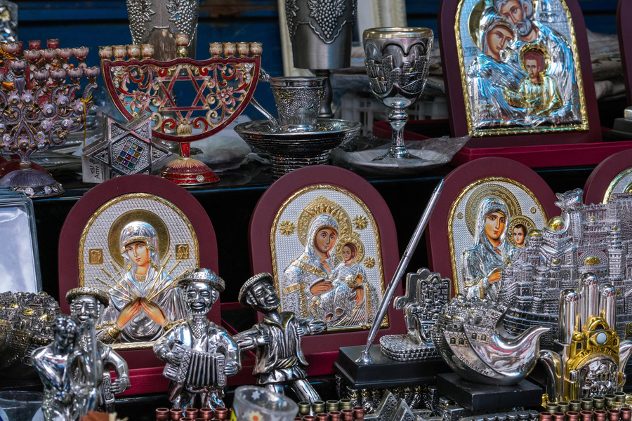 Icons and menorahs at Carmel Market