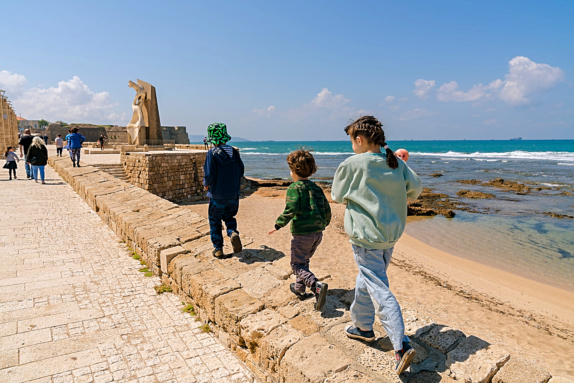 Children strolling in Acre, Israel