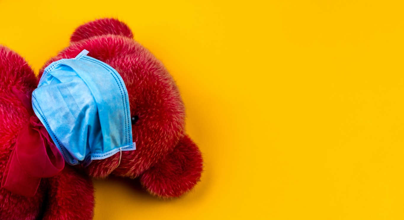  Red Teddy bear in a protective medical mask